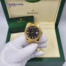 Rolex Day-Date 40 228238 Yellow Gold Black Baguette Diamond Dial